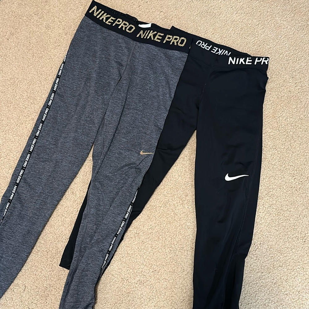 Two pairs of Nike Pro leggings - size S